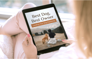 Best Dog, Best Owner: dog leadership guide, a free UltraK9 Pro bonus ebook shown on a tablet